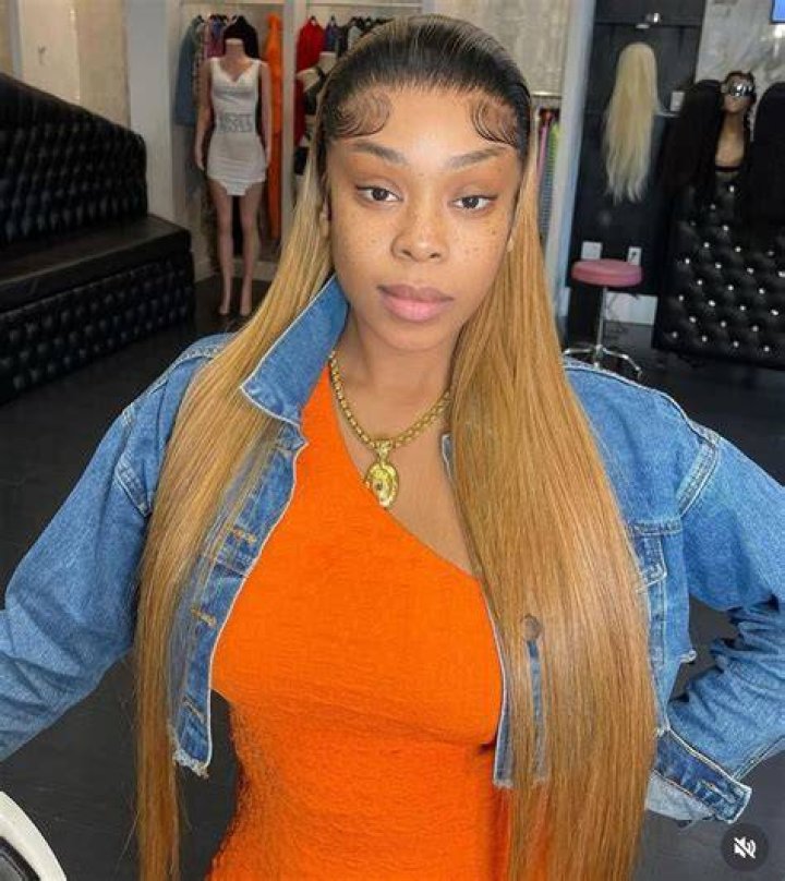 Shay Johnson can be seen wearing a huge earnings in the picture.